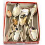 Two Scottish silver tablespoons, two tablespoons, a butter knife, tongs and six teaspoons