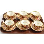 Six Imari cups and saucers