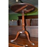 A George III oak and fruitwood tripod table