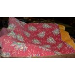 Red floral and yellow reversible quilt and assorted linen