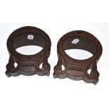 A pair of Scandinavian carved wooden stirrups