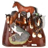 Beswick horses including a harnessed shire, three other brown models and figure of a falcon (5)