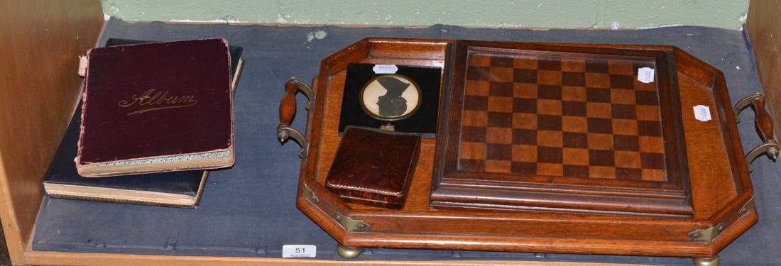 A twin handled tray, autograph book, draught board, three studs stamped 9ct, etc