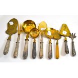 A Continental silver and parcel gilt five piece setting of cake and fruit servers etc