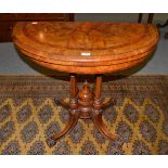 Victorian walnut and crossbanded semi-circular fold over card table