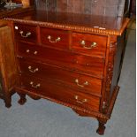 A reproduction hardwood six drawer chest