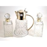 A pair of silver topped decanters and a plated lemonade jug (3)