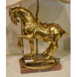 A decorative lamp in the form of a horse