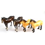 Beswick horses comprising two Highland ponies and two Arab ponies in brown gloss (4)