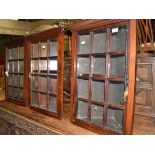 Three rosewood hanging corner cupboards