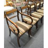 Set of eight Regency style mahogany and brass inlaid dining chairs