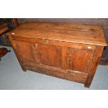 An 18th century joined oak chest with hinged lid