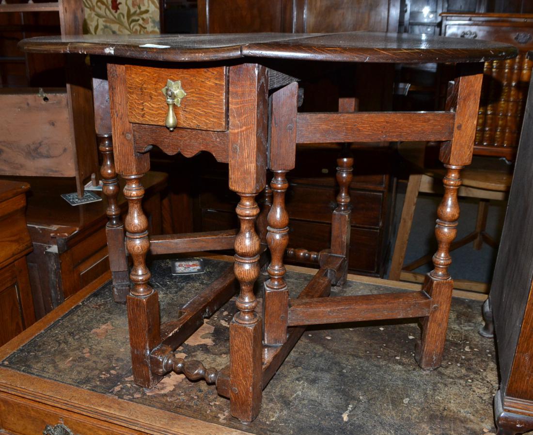 An early 18th century gateleg dining table