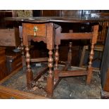 An early 18th century gateleg dining table