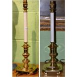 A pair of brass candlesticks in the form of table lamps