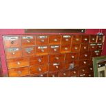 A bank of Victorian chemists' drawers