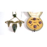 Scarab pendant, a cased set of studs and brooch