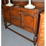 A 1920s oak sideboard