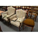 A pair of late Victorian armchairs, later re-covered, and a Victorian walnut salon chair