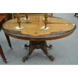 A Victorian walnut oval breakfast table