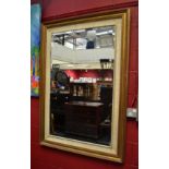 A reproduction gilt framed mirror