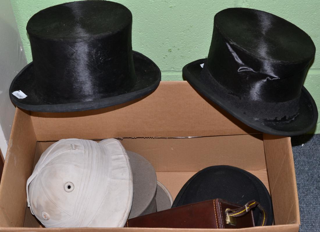 Herbert Johnson bowler hat, three top hats, one polo helmet by Herbert Johnson and a pair of