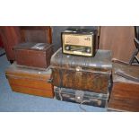 A 19th century oak trunk, two tin trunks, leather case, a Bakelite cased radio, a stained pine small