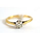 An old mine cut diamond solitaire ring