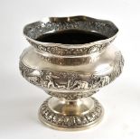 An Anglo Indian silver bowl on pedestal foot, engraved with hunting scenes