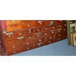 A bank of Victorian chemists' drawers