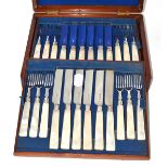 An incomplete set of silver and mother-of-pearl dessert knives and forks, cased