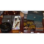 Two trays of collectables including fans, pewter mounted boxes tins, etc