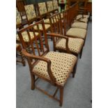 A set of six George III mahogany dining chairs with drop-in seats