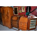 A late Victorian glazed free standing corner cupboard, an Edwardian mahogany bureau, an oak bureau