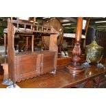 A copper coal scuttle, a plant stand and a wall cabinet