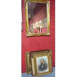 A reproduction gilt framed mirror and four Victorian prints