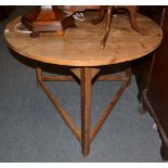 A 19th century pine cricket table