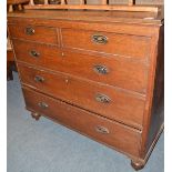 An oak four height chest of drawers