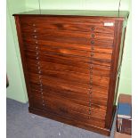 A reproduction eighteen drawer collector's cabinet