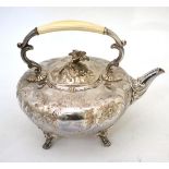 An Old Sheffield Plate tea kettle/teapot, of melon form and chased with flowers and foliage, with