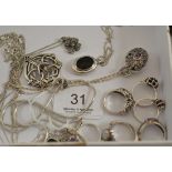 Assorted silver and white metal jewellery including a garnet set zoomorphic pendant on chain, rings,