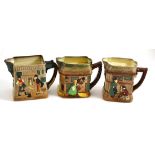 Three Royal Doulton jugs: The Old Curiosity Shop, The White Heart Inn and Oliver Twist