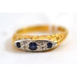 An 18ct gold sapphire and diamond ring