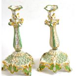 Pair of porcelain green and gilt candlesticks (restored)