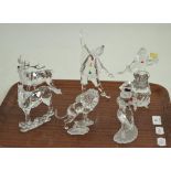 A collection of Swarovski comprising: Masquerade 1999, 2000 and 2001 (05617395, 02801329,