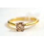 An 18ct gold diamond solitaire ring