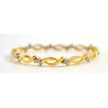 An 18ct and diamond bracelet