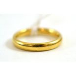 An 18ct gold band ring