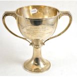 A silver twin handled trophy cup, London 1931