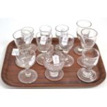 Eleven assorted 18th century and early 19th century wines and fishing glasses  Chips throughout,